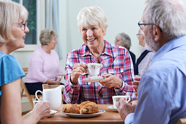 Group Of Seniors Meeting At Social Club